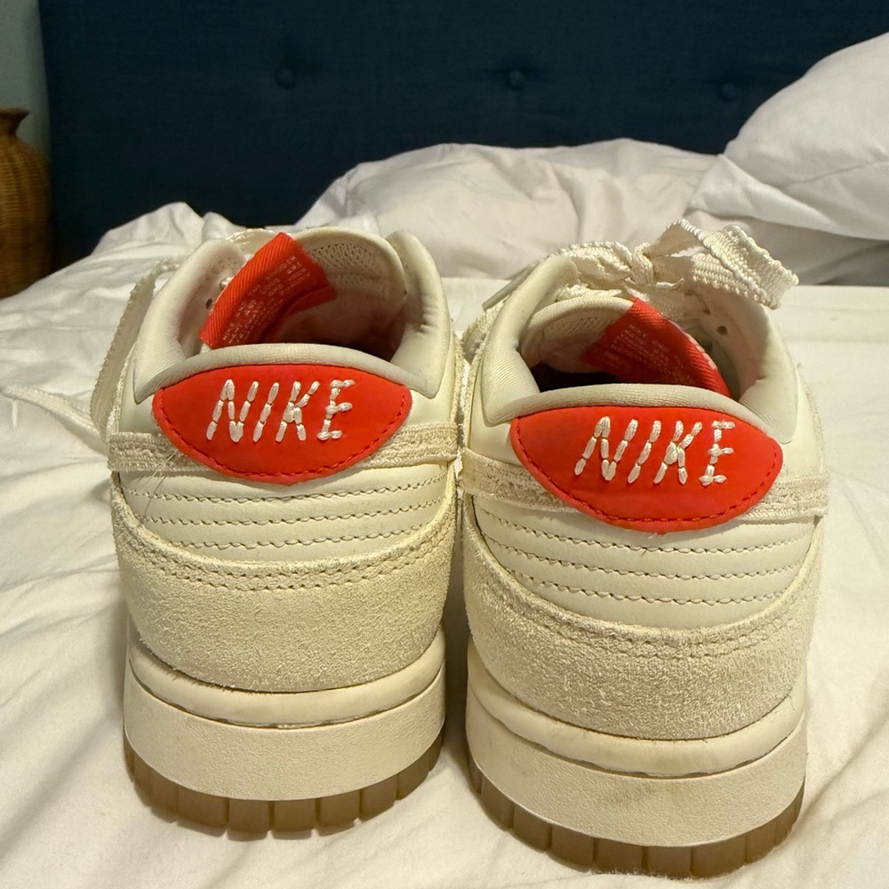Nike women’s Cream and Red Sneakers